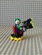 LEGO Batman 212116 Superheroes: The Joker with Glue Gun минифигурка: эксклюзивная коллекционная Джокер с Пушко 892287 фото 2