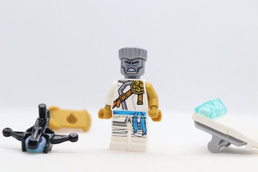 Мініфігурка колекційна LEGO Ninjago 892173 Zane Golden Ninja Мініфігурка Зейна з &laquo;Володаря гори&raquo; з закидувачем лука Лего Ніндзяго 892173 фото
